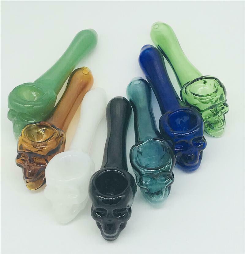 One- Skull Colored Glass Tobacco Pipe Clear 4" Long, Toke Smoking Bowl Hitter.